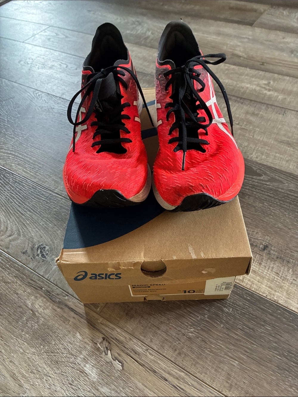 Asics Magic Speed - Orange Running Shoes with Black and White Details - size 10